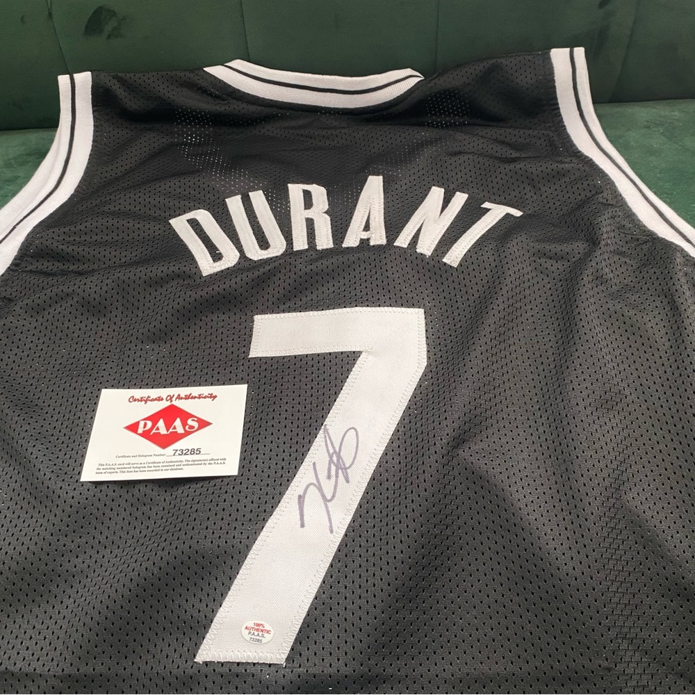 Autographed Kevin Durant jersey with Certificate of Authenticity.